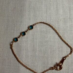 Vintage signed Avon Child's Elegant Gold Tone Open Bezel Blue Crystal Bracelet
